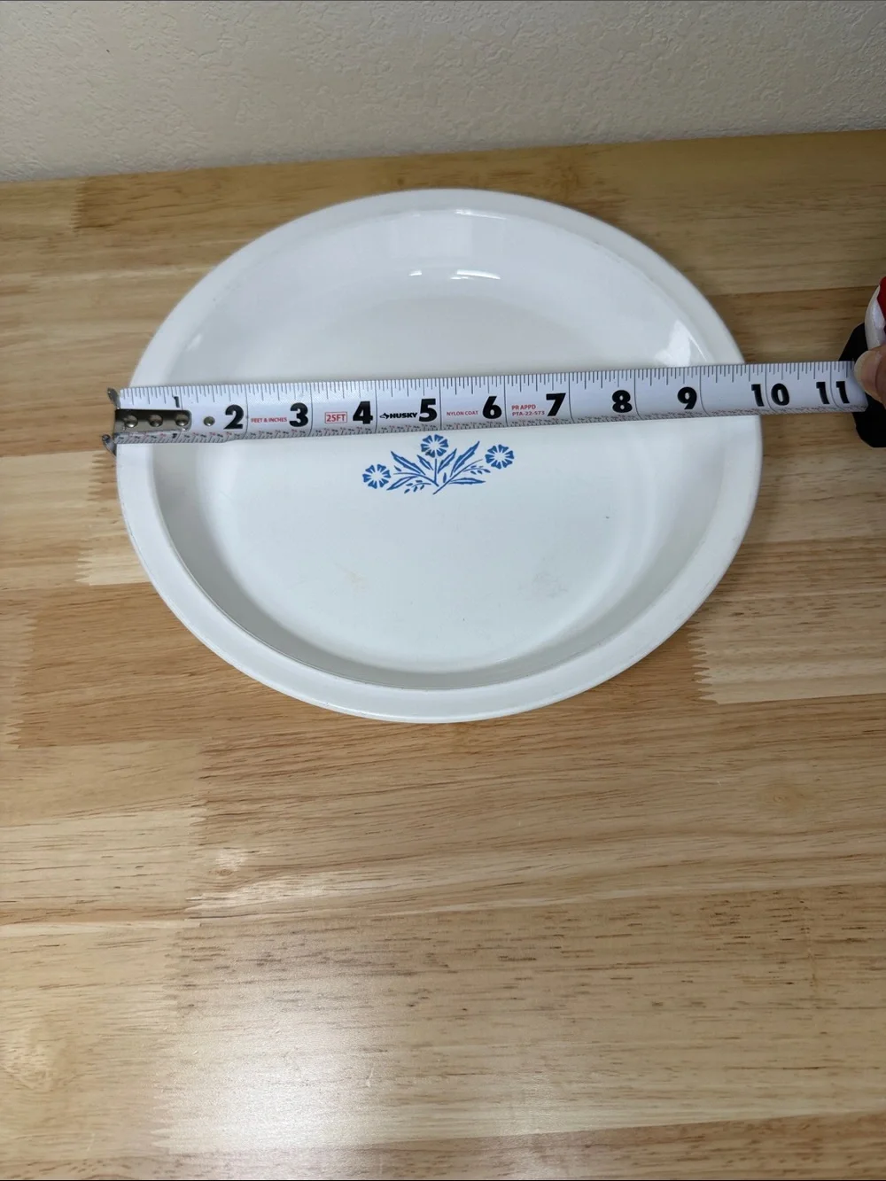 Vintage CorningWare 9-inch pie plate featuring the classic Blue Cornflower.